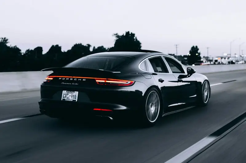 Sports car driving on a highway
