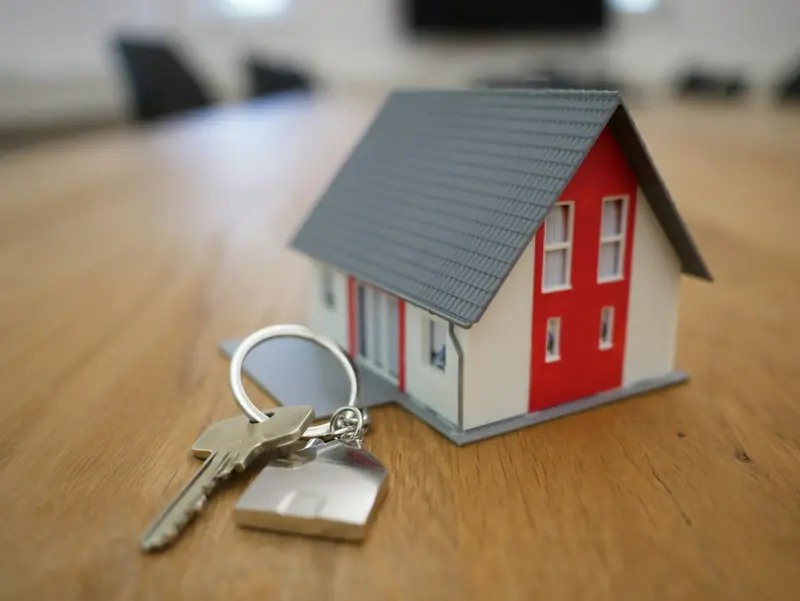 House model with keys on a table